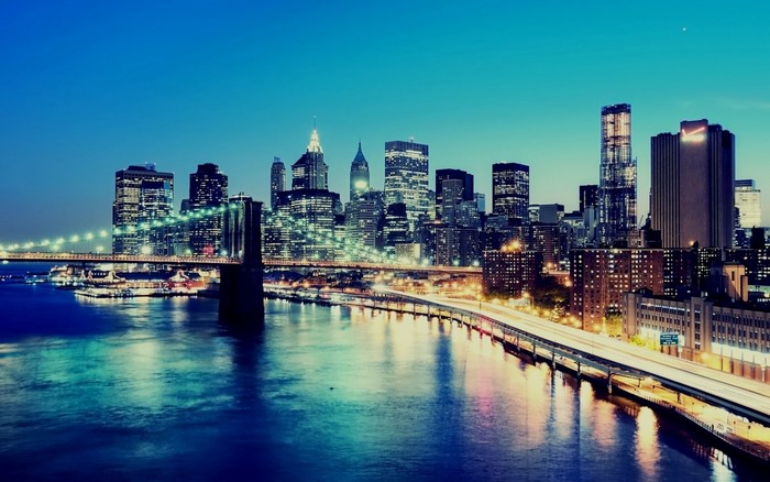 New York City skyline and Brooklyn Bridge at night