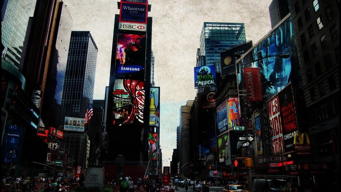 Times Square billboards with Coca-Cola and Samsung ads