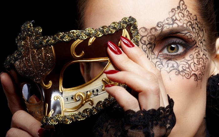 Woman with Venetian mask and face paint