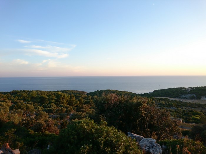 Sea and hills at sunset