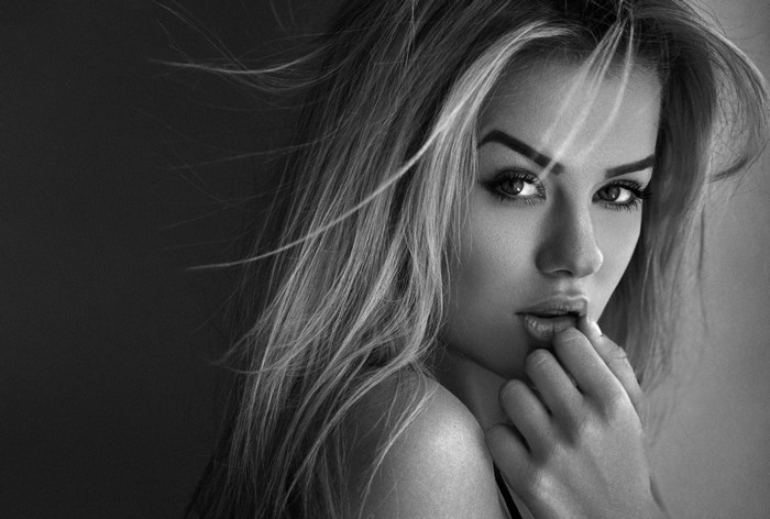 Monochrome portrait of a woman with blond hair