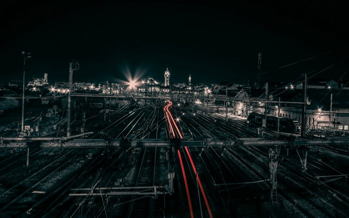Train station at night with light trails in Limoges, France