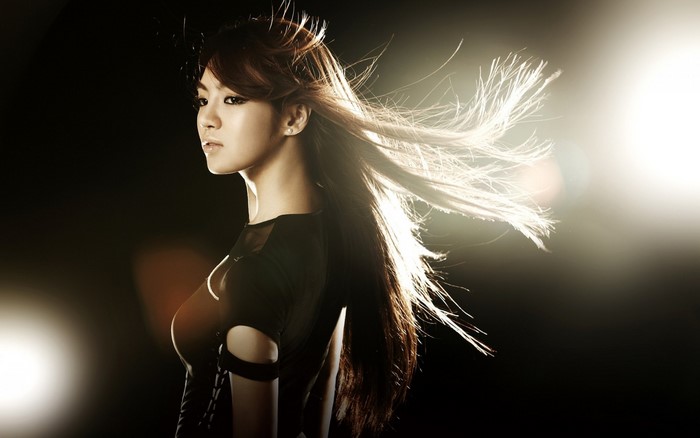 Woman with windblown hair in a photoshoot