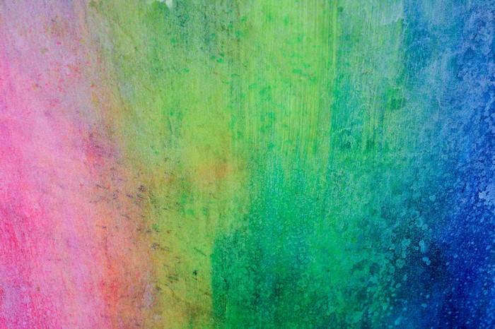 Abstract colorful watercolor painting with pink, green, and blue hues