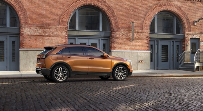 Cadillac XT4 SUV parked on cobblestone street