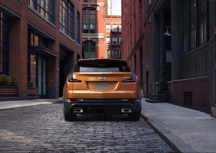 Cadillac XT4 parked on cobblestone street
