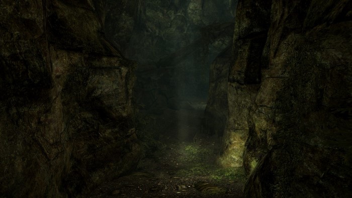 Cave entrance with sunlight in The Elder Scrolls V Skyrim