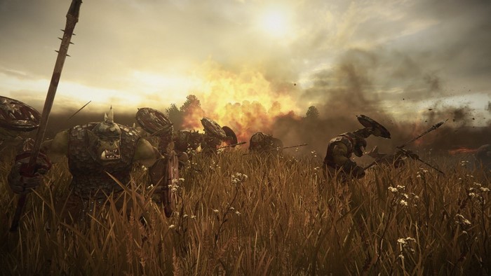 Orcs in Total War: Warhammer during an explosion