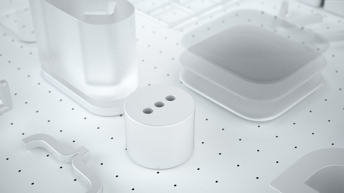 White 3D objects on dotted surface