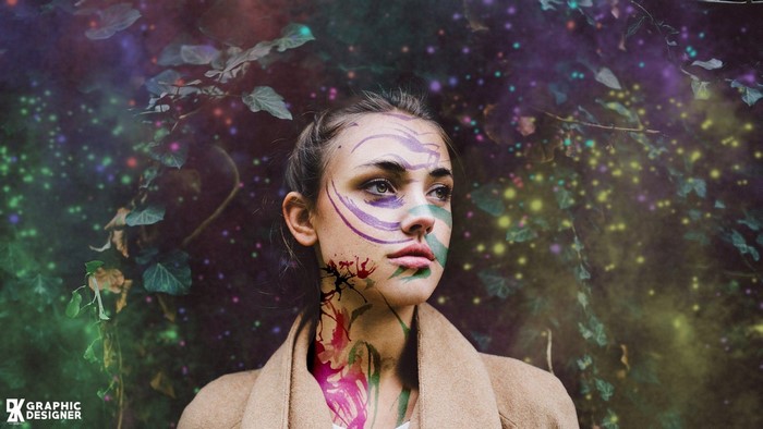 Woman with body paint and leaves
