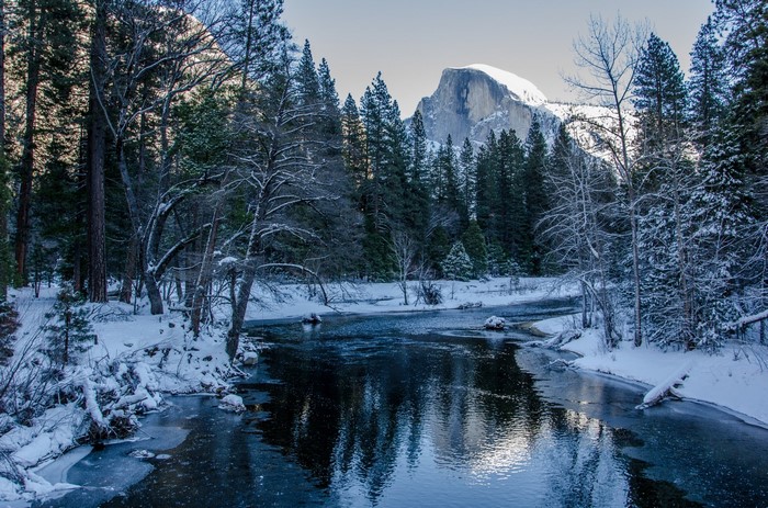 Winter landscape with Half Dome and river in Yosemite
