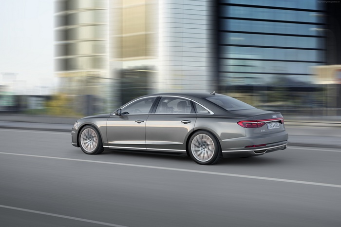 Audi A8 L driving on a city street