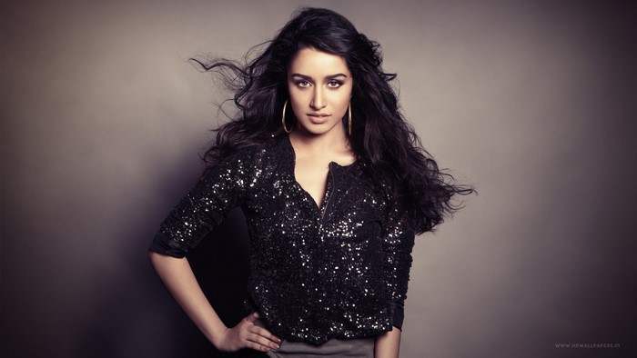 Shraddha Kapoor posing in a black sequined jacket