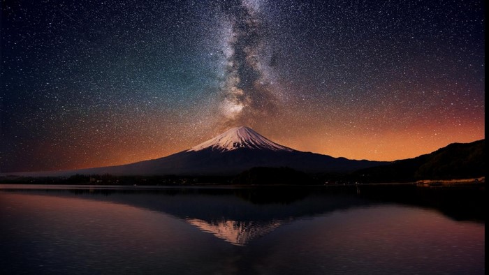 Mount Fuji under the Milky Way with reflection