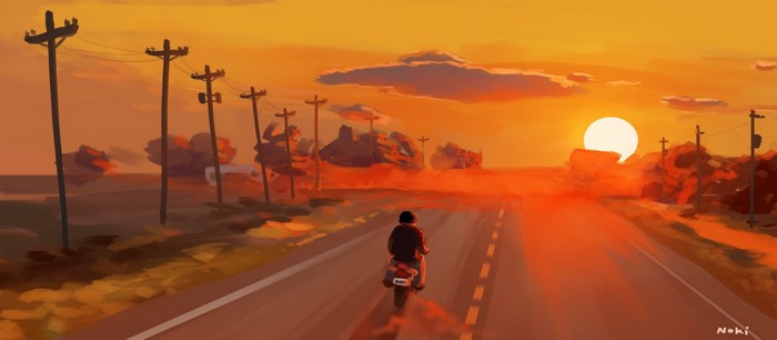 Person riding a motorcycle on a road at sunset