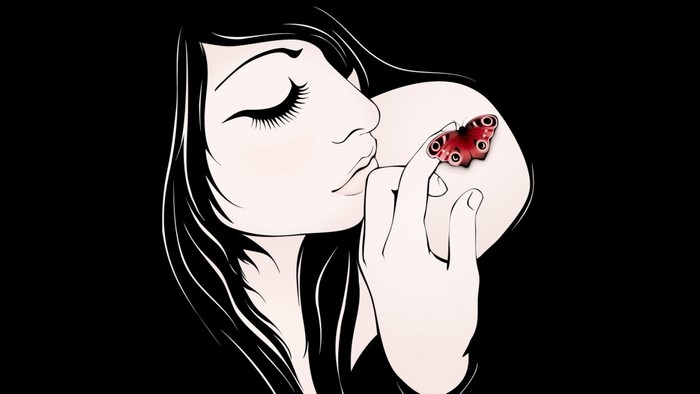 Woman with a butterfly on her finger