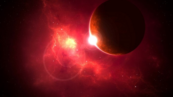 Planet eclipsing a bright star in a red nebula