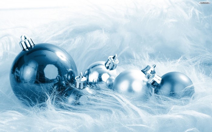 Christmas ornaments on white fluffy background
