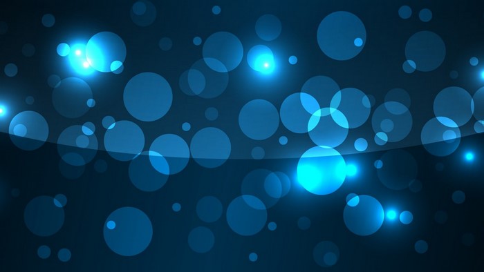 Abstract blue bokeh circles with lens flares