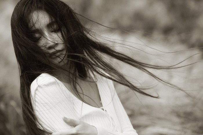 Monochrome portrait of a woman with long hair