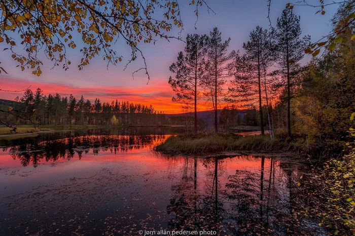 Autumn Sunset Reflection on Tranquil Lake