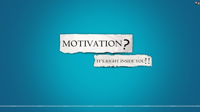 Motivation quote on torn paper