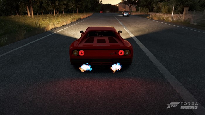 Red Ferrari GTO with flames from exhaust in Forza Horizon 2