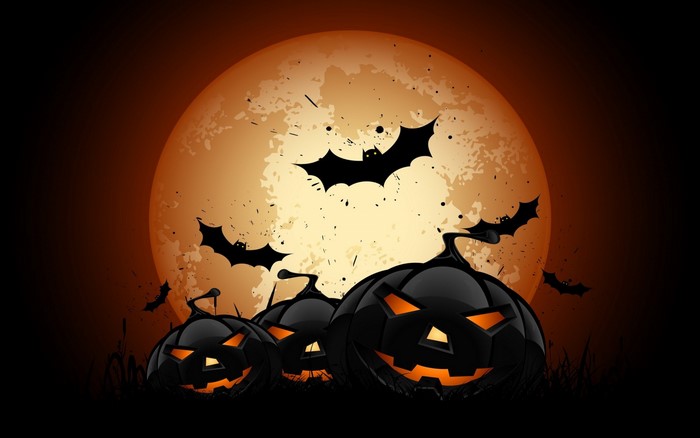 Halloween pumpkins and bats against a full moon