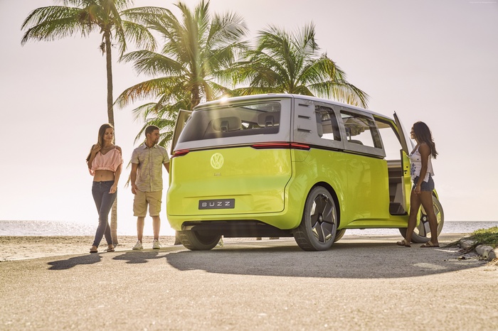 Volkswagen ID Buzz electric car on beach with people