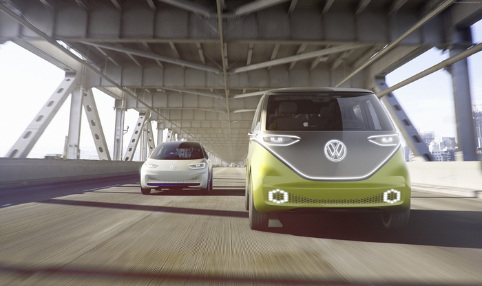 Volkswagen ID Buzz and ID.4 electric cars on bridge