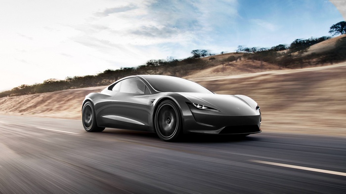 4K Tesla Roadster electric car on a road
