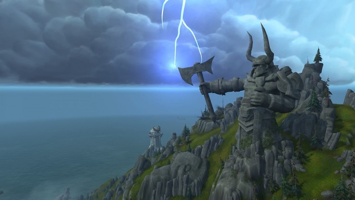 Giant stone statue of a warrior with an axe in World of Warcraft