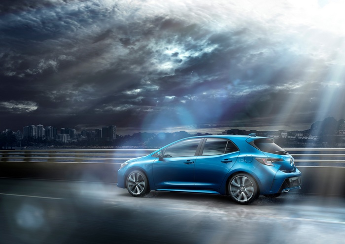 2019 Toyota Corolla Hatchback on a wet road