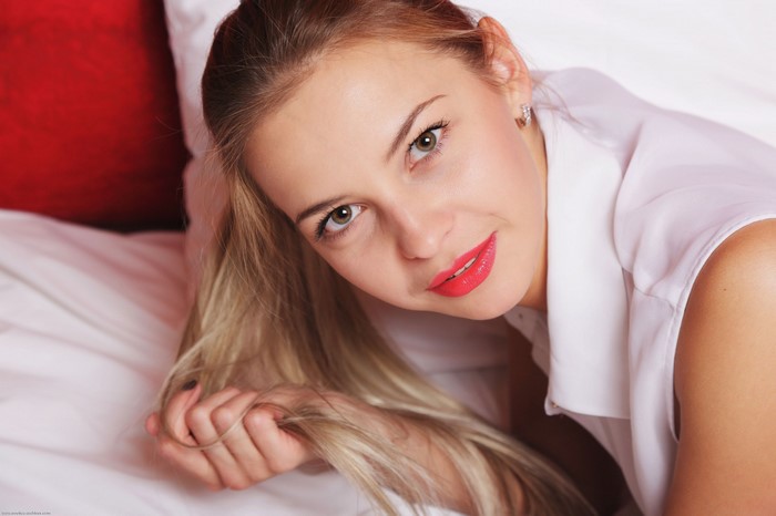 Portrait of a Blonde Woman with Red Lipstick