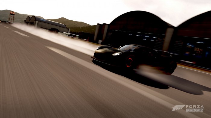 Hennessey Venom GT driving on a track in Forza Horizon 2