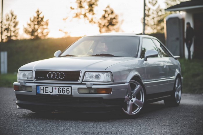 Silver Audi Coupe with custom wheels