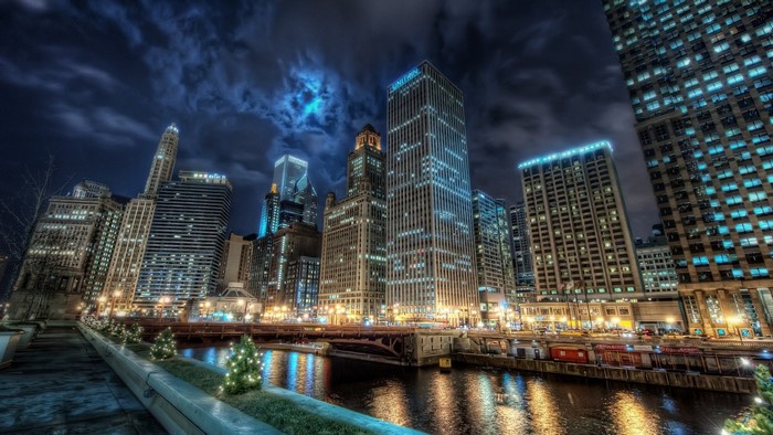 Chicago cityscape at night with river reflections
