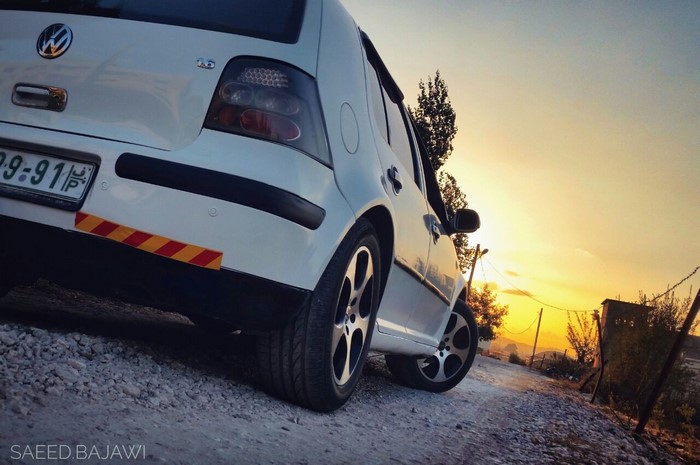 Volkswagen Golf car at sunset