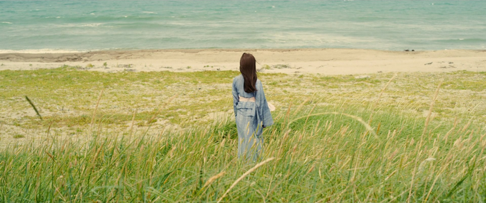 Kaoru Kamiya from Kenshin Legend Ends on a grassy shore
