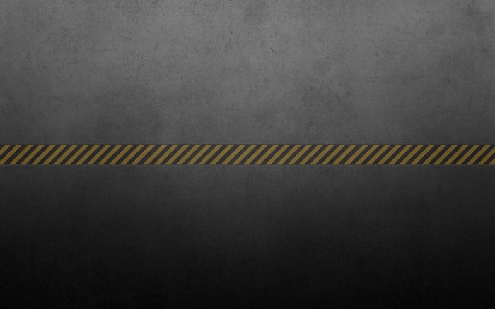 Caution tape on a textured surface