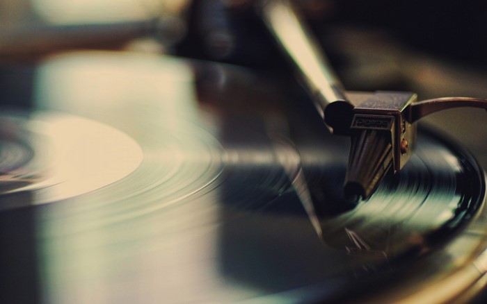 Close-up of a record player needle on a vinyl record
