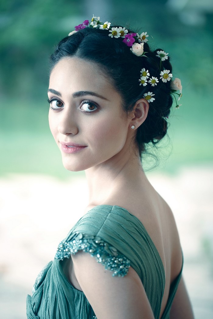 Emmy Rossum wearing a floral crown and green dress