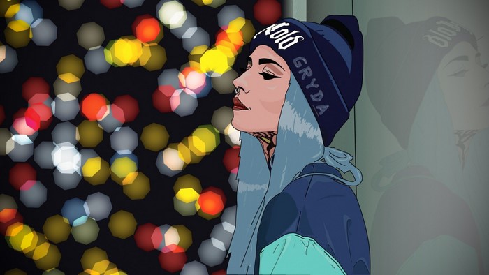 Woman with blue hair and tattoos wearing a beanie