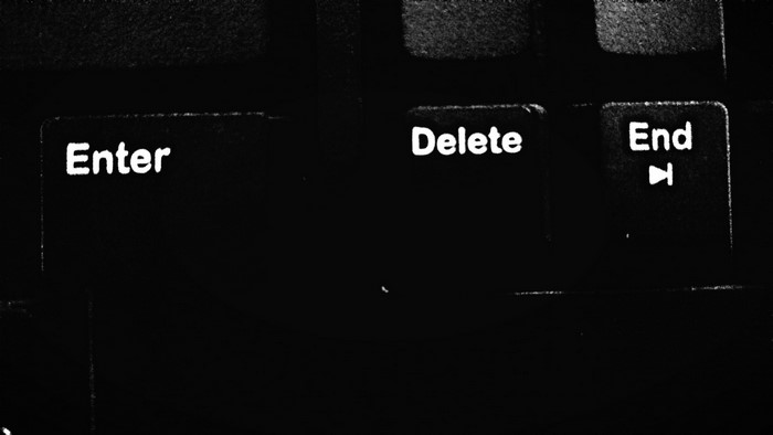 Close-up of computer keyboard keys: Enter, Delete, End