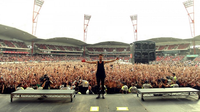 Jared Leto performing with Thirty Seconds To Mars in a stadium