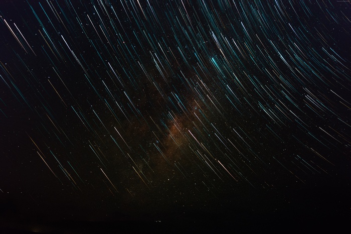 Star trails and galaxy in the night sky