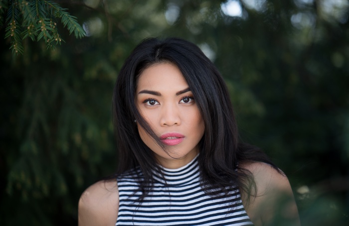 Asian model in striped top