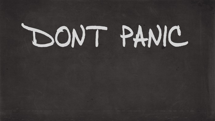 Dont Panic written on a blackboard