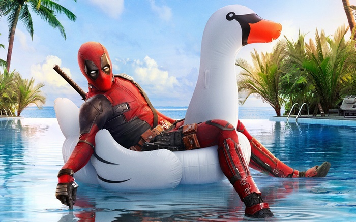 Deadpool on a Swan Float in a Pool