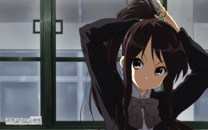 Kyon from The Melancholy of Haruhi Suzumiya tying her hair